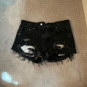 Black ripped Levi jean shorts, size 29